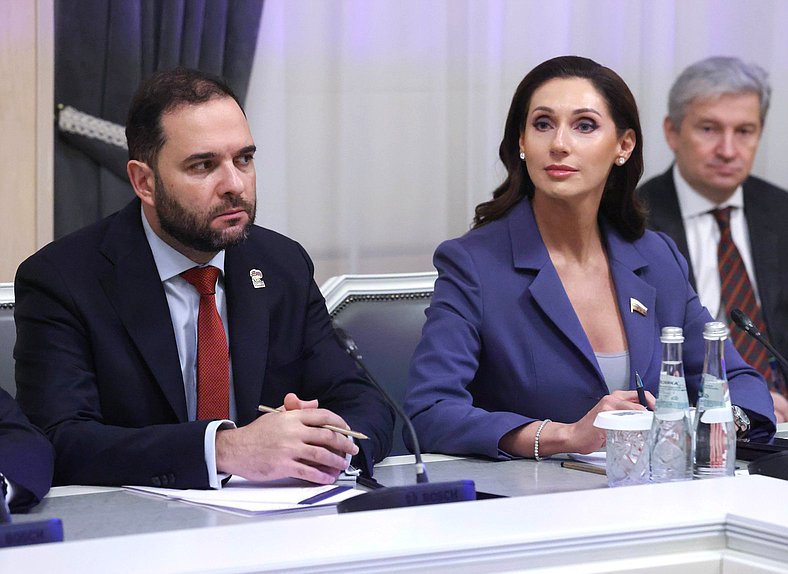 First Deputy Chairman of the Committee on Science and Higher Education Alexander Mazhuga and member of the Committee on International Affairs Roza Chemeris