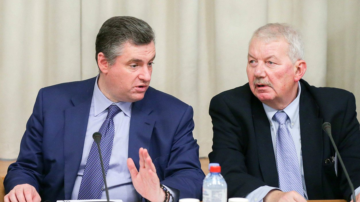 Chairman of the Committee on International Affairs Leonid Slutskiy and academician of Russian Academy of Sciences Sergey Rogov