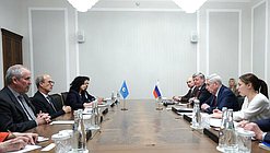 Melnikov and  González