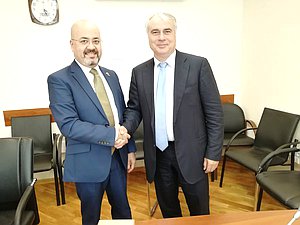 Ambassador Extraordinary and Plenipotentiary of the Republic of Iraq to the Russian Federation Haidar Mansour Hadi Avis and Chairman of the Committee on Energy Pavel Zavalnyi