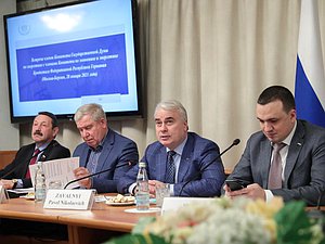 Chairman of the Committee on Energy Pavel Zavalnyi, First Deputy Chairman of the Committee Sergei Esiakov and members of the Committee Gennadii Skliar and Dmitrii Ionin