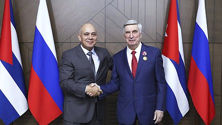 Politburo member, Secretary of the Central Committee of the Communist Party for Organizational Affairs, and member of the National Assembly of People's Power of the Republic of Cuba Roberto Tomás Morales Ojeda and First Deputy Chairman of the State Duma Ivan Melnikov