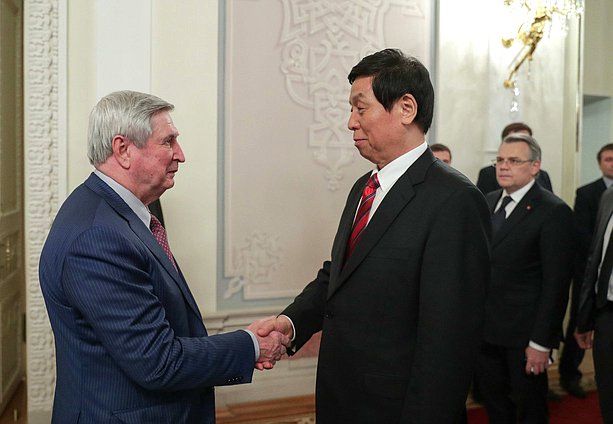 First Deputy Chairman of the State Duma Ivan Melnikov and Chairman of the Standing Committee of the National People's Congress of the People's Republic of China Li Zhanshu